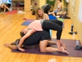 Child and wheel pose