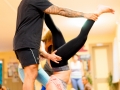 assisted partner tripod headstand